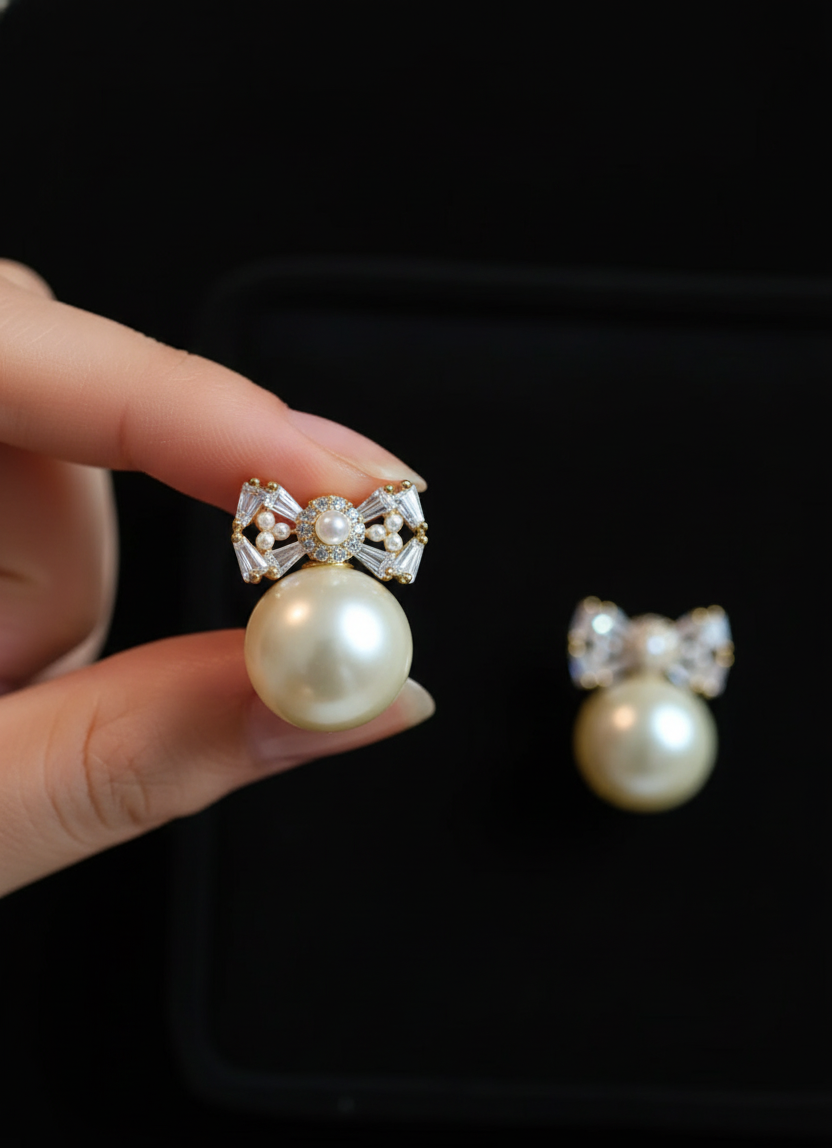 Pearl Drop Earrings with Crystal Bow Design